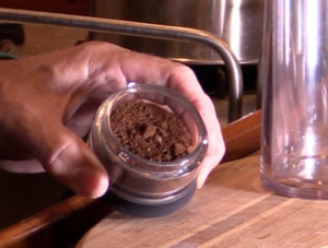 Coffee grounds in American press pod